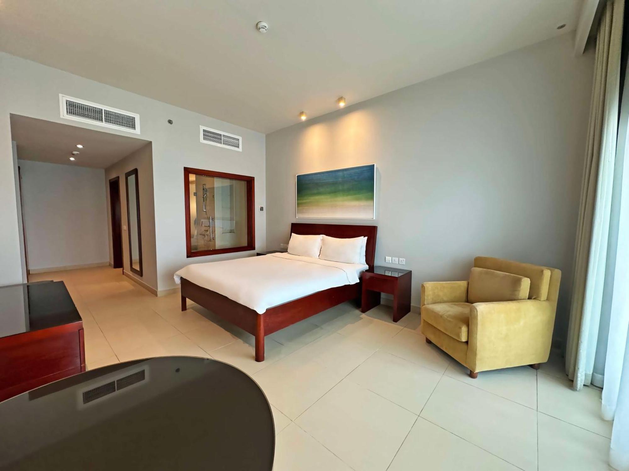 Radisson Blu Resort, Al Fujayrah Exterior foto A bedroom at the hotel