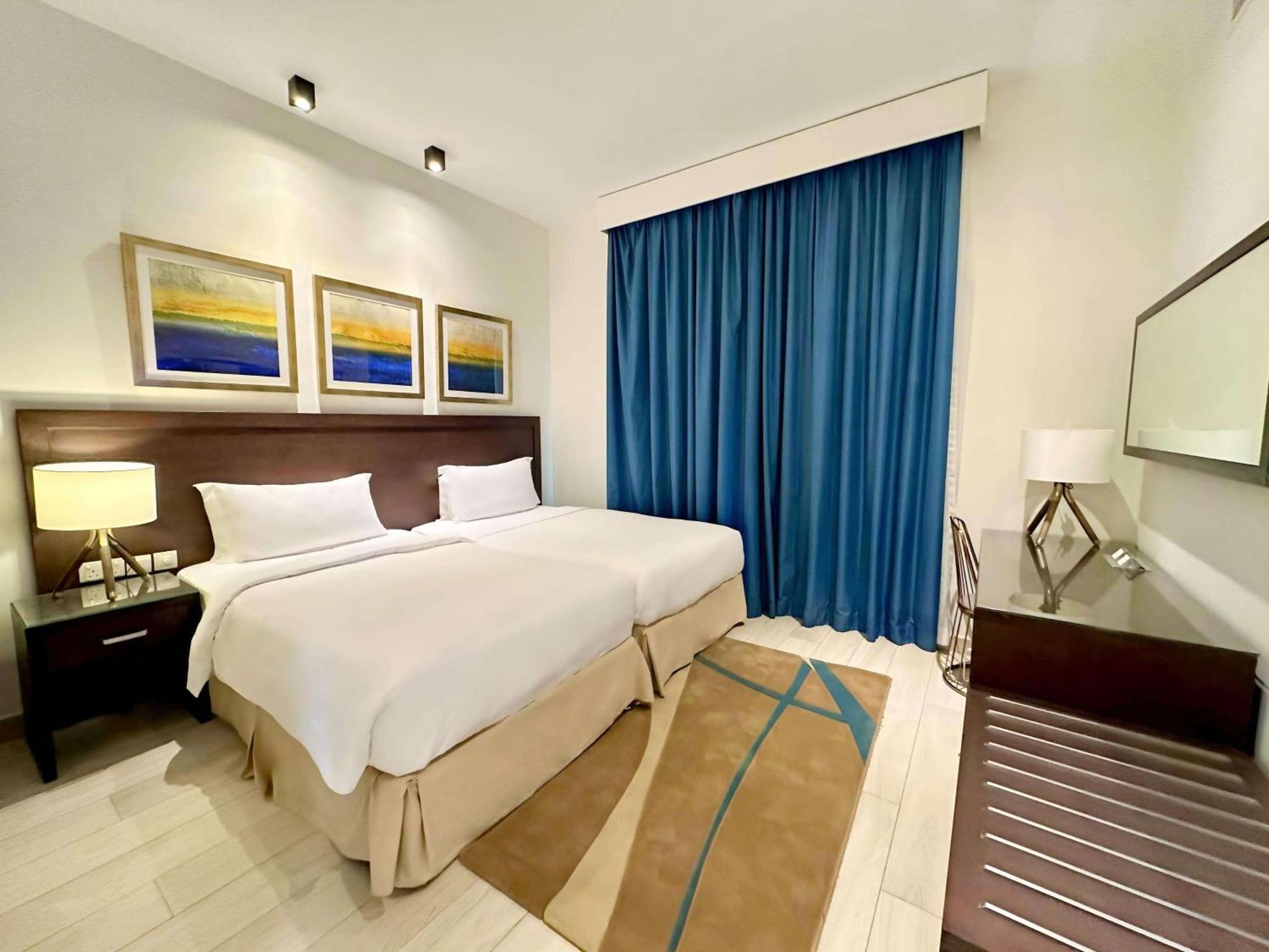 Radisson Blu Resort, Al Fujayrah Exterior foto A bedroom at the hotel